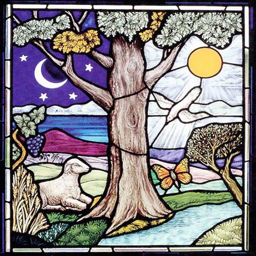 Stained Glass Window Adorned With Christian Symbols
